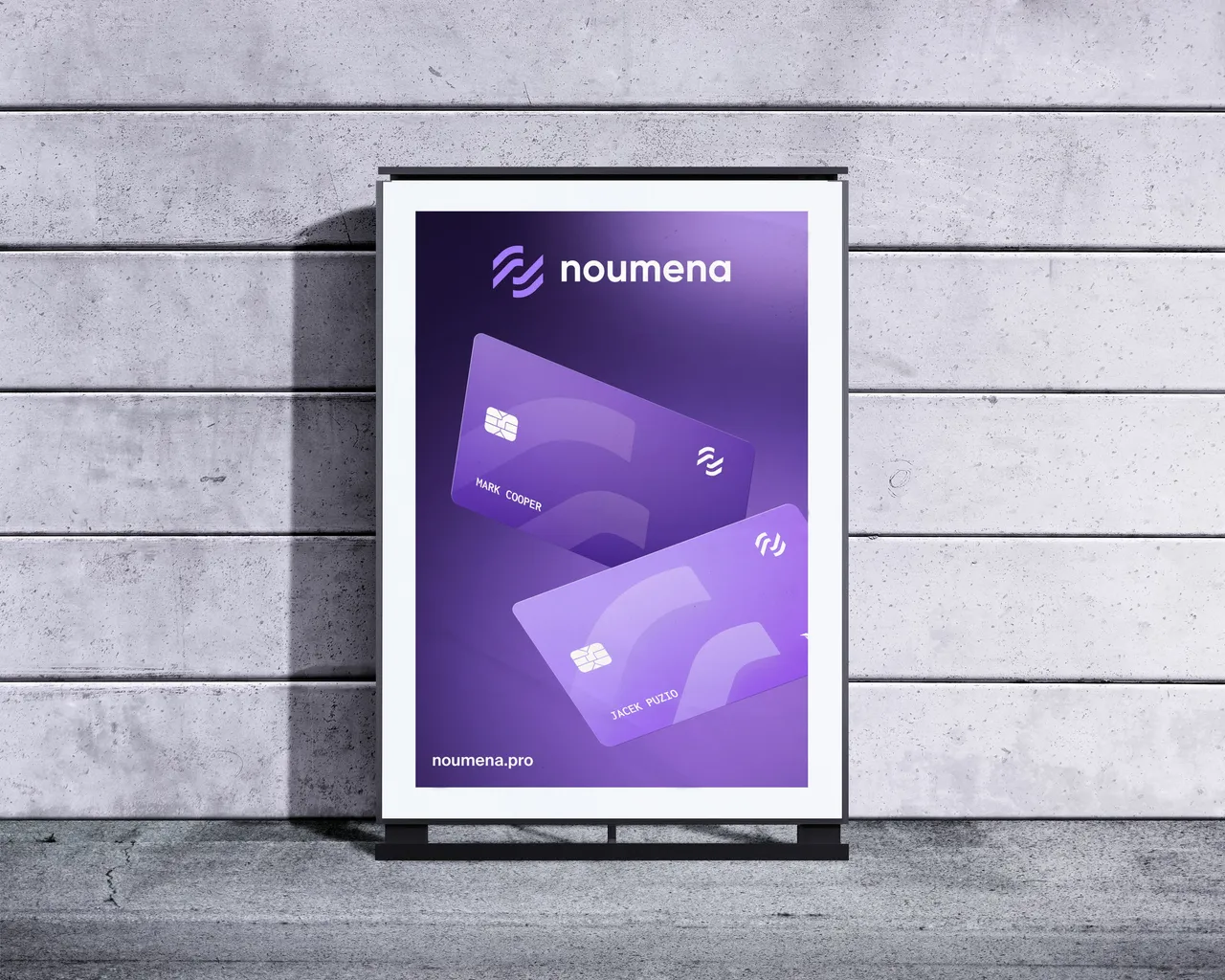 Outdoor poster with the Noumena logo and two payment cards